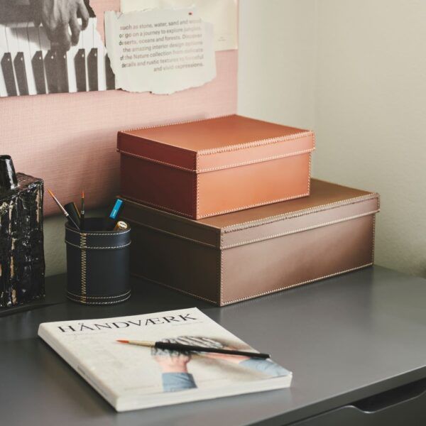 storage-boxes-in-leather-on-desk-orskov